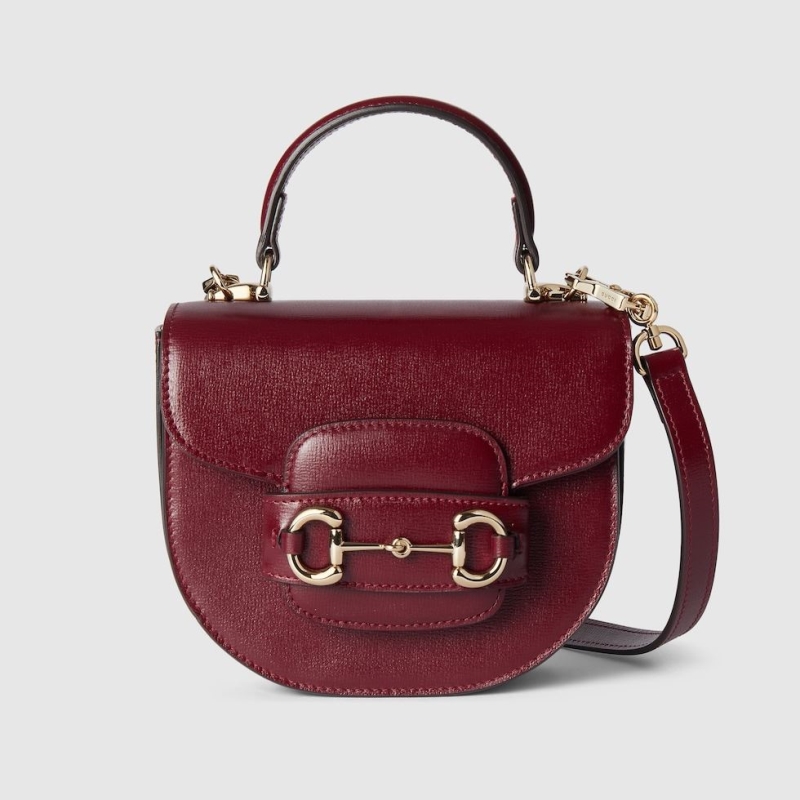 G*u*i top handle bags